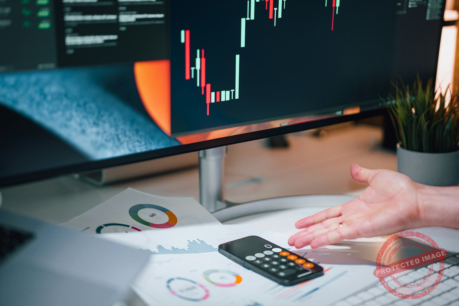 An analyst reviews AI infrastructure cost figures with a calculator and charts