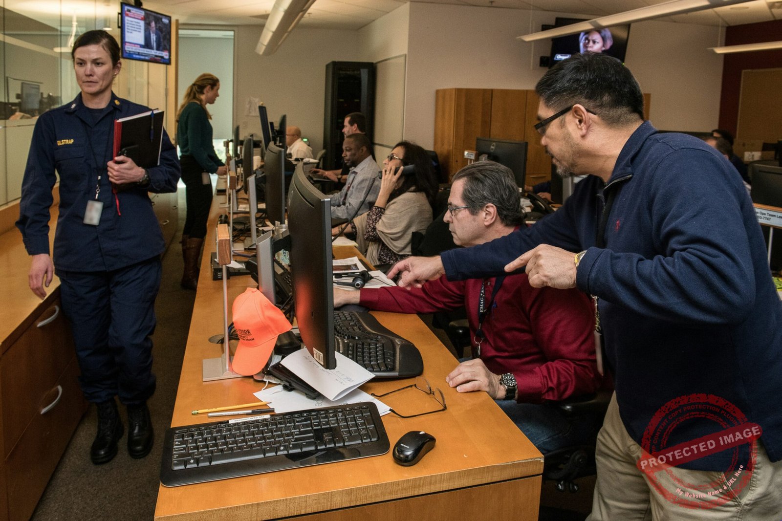 Engineers at workstations reviewing distributed traces and spans from AI agent runs