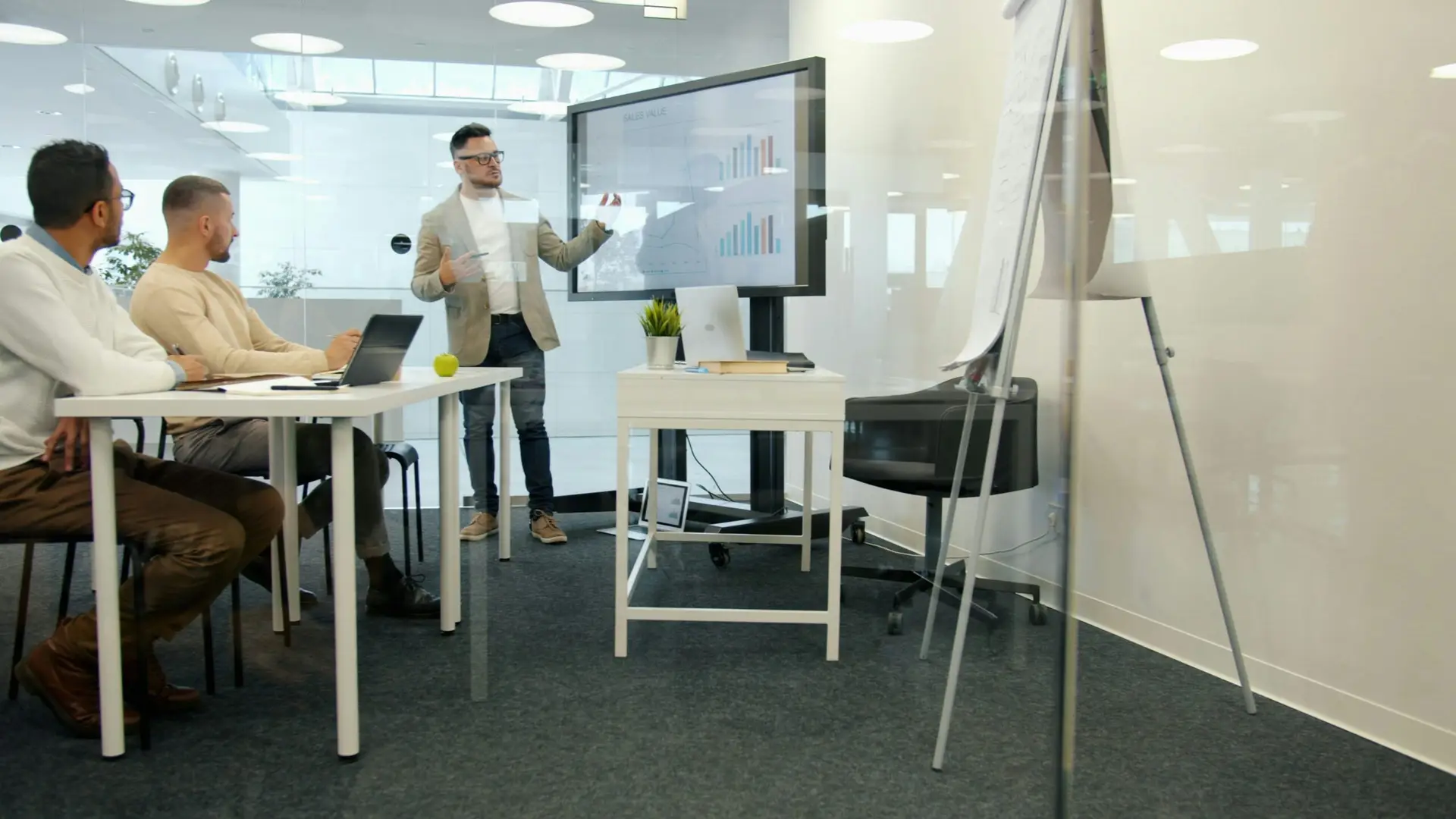Business and technology leaders reviewing AI agent governance metrics on a boardroom screen